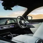 BMW 7 Series with a professional chauffeur offering an exclusive and luxurious transportation experience in London.