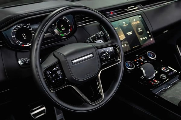 Private Range Rover with a professional chauffeur, providing elite transportation for business meetings in London.